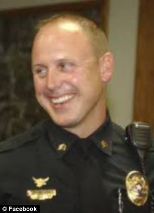 cop shoots dog