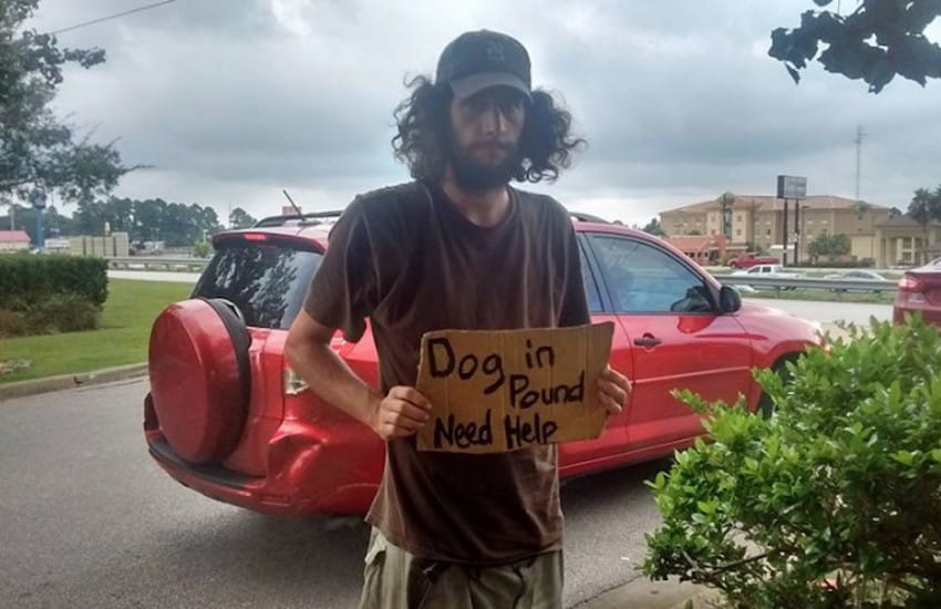 homeless man sign
