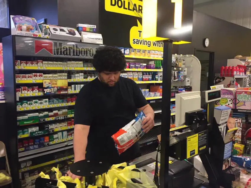 cashier pays bill