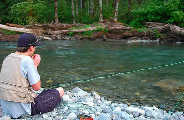 man catches big fish