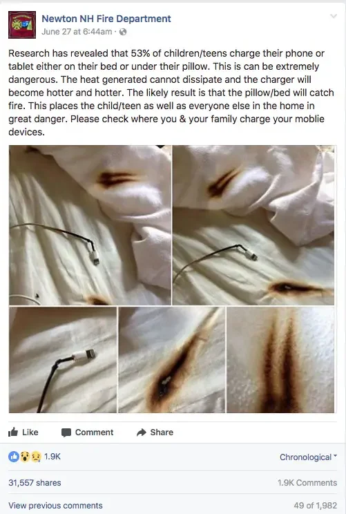 phone charging on bed