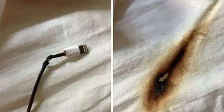 phone charging on bed