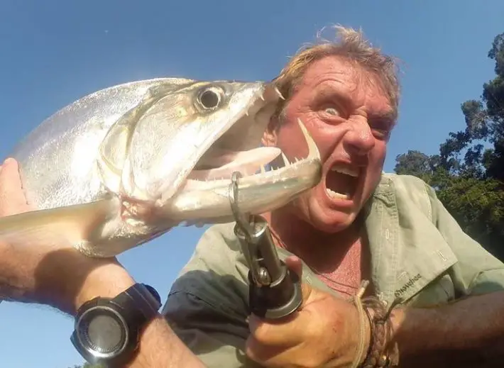 man catches big fish