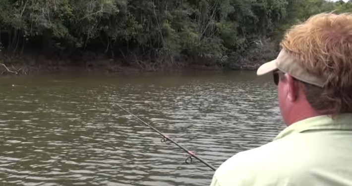 man catches big fish