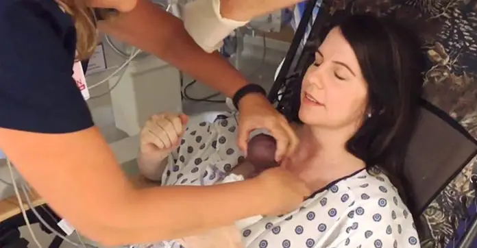 mom-holds-12-ounce-baby