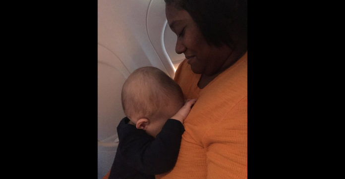 baby-sleeps-on-stranger