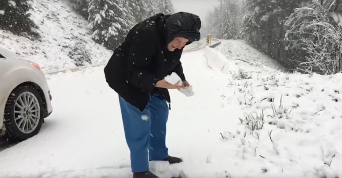 old-mum-happy-snow