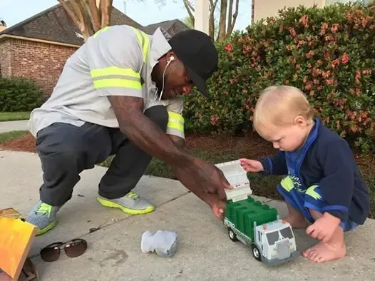 garbageman and baby