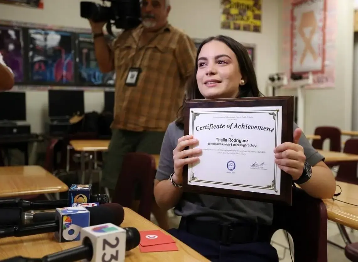 student saves cop