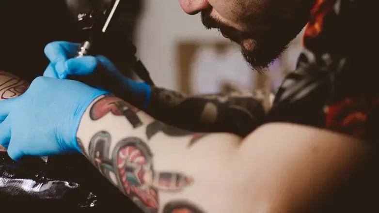 man dies because of tattoo
