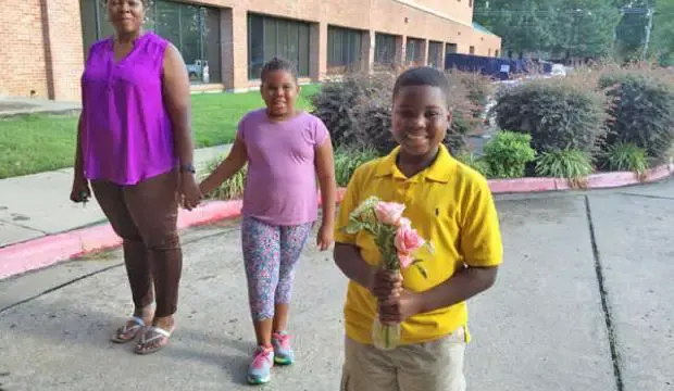 little boy saves neighbor