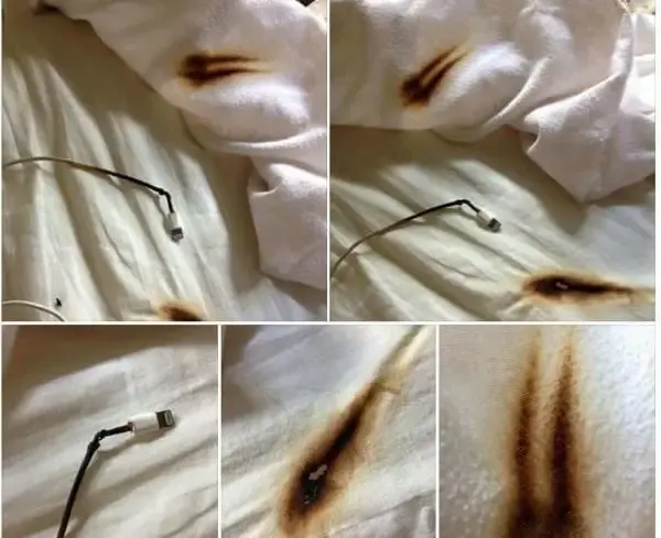 phone charging on bed