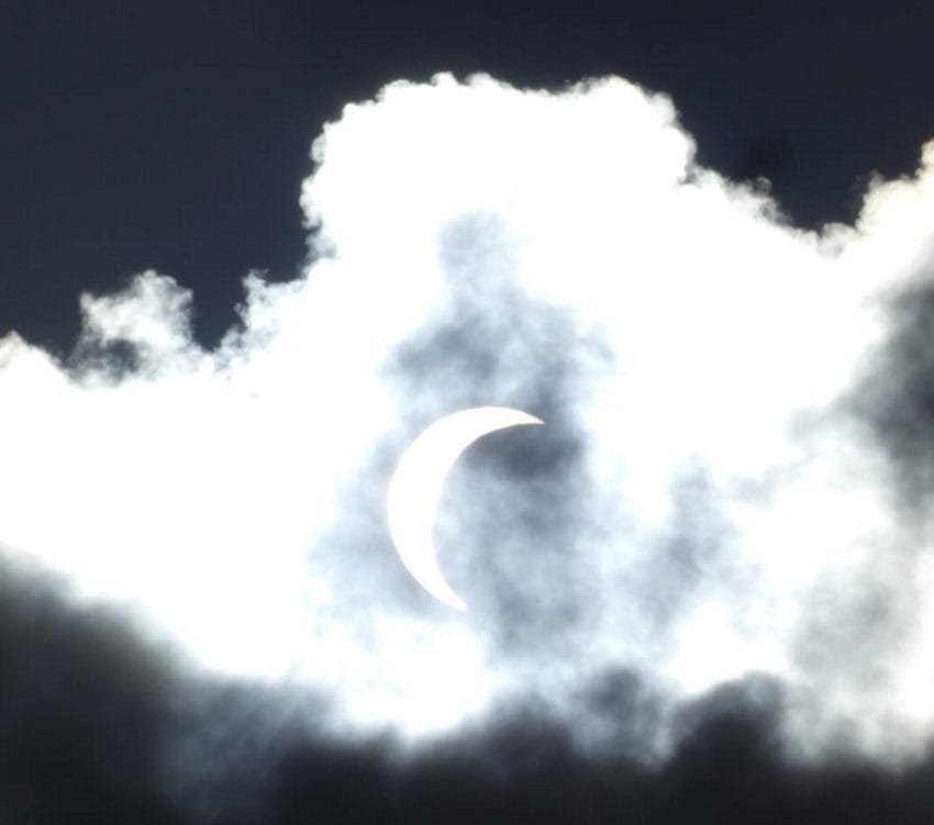 mysterious shadow behind moon