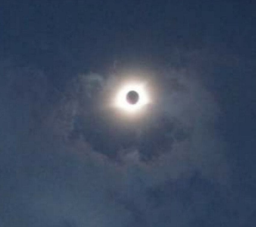 mysterious shadow behind moon