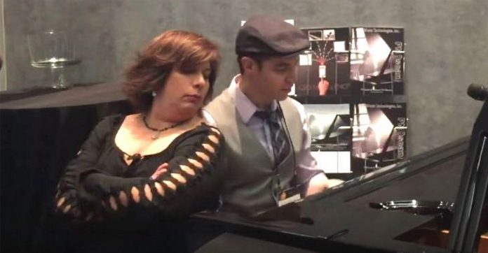 she-watches-mans-piano-skills