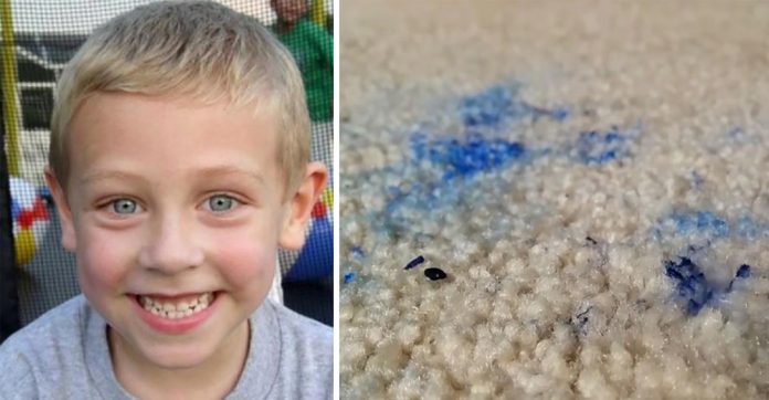 boy-passes-blue-stain-carpet