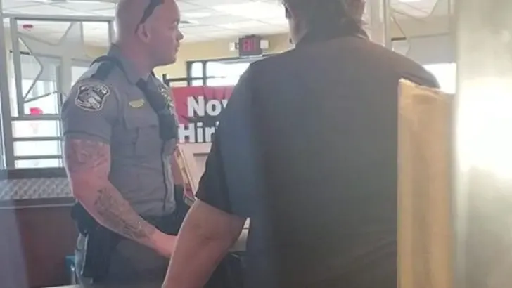 cop buys homeless man meal