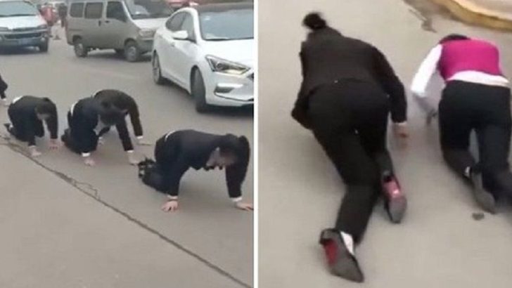 employees forced to crawl street