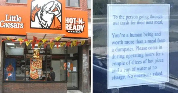 pizza-store-hangs-door-sign pizza store hangs door sign