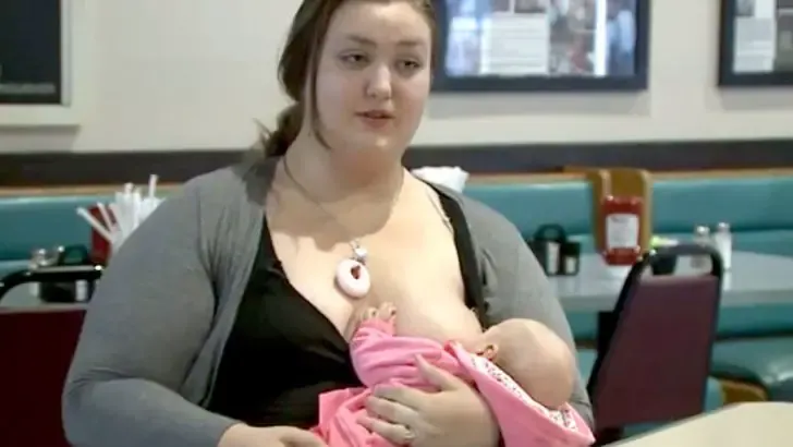 tired mom breastfeed baby
