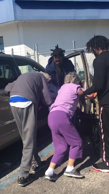 3 Young Men Help Shaky Elderly Couple