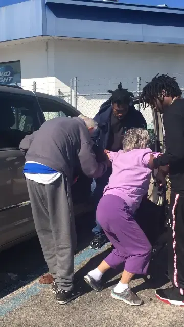 3 Young Men Help Shaky Elderly Couple