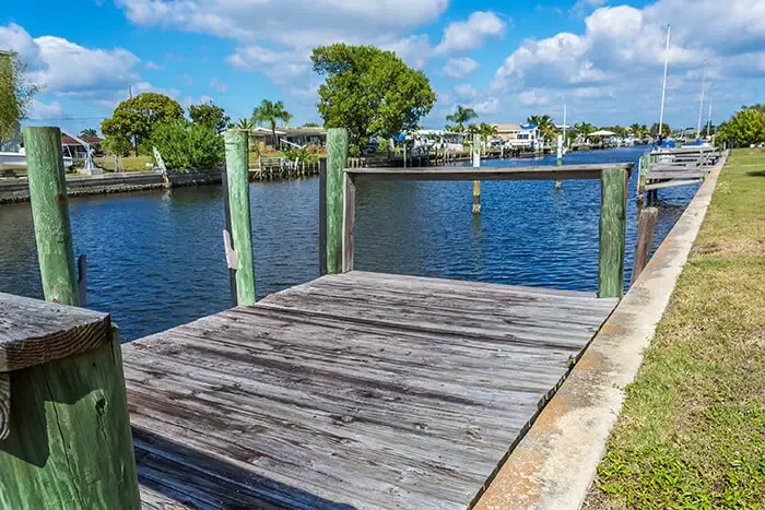 Old Weathered Boat Dock on a Canal in Florida