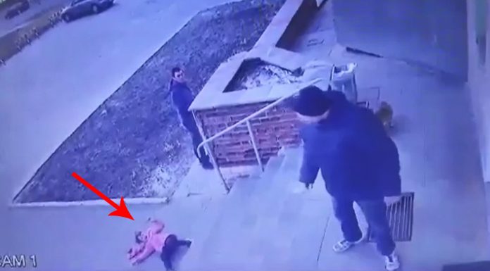 father throwing daughter stairs