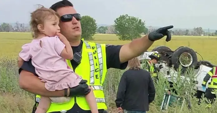 officer-comforting-2-year-old