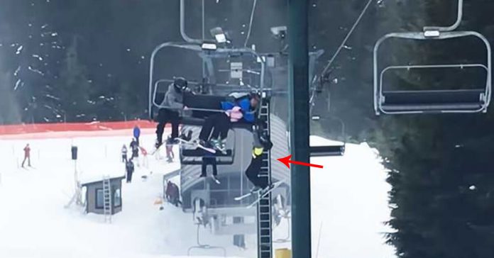 boy-dangling-from-ski-lift